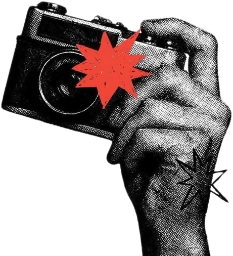 Hand gripping a film camera